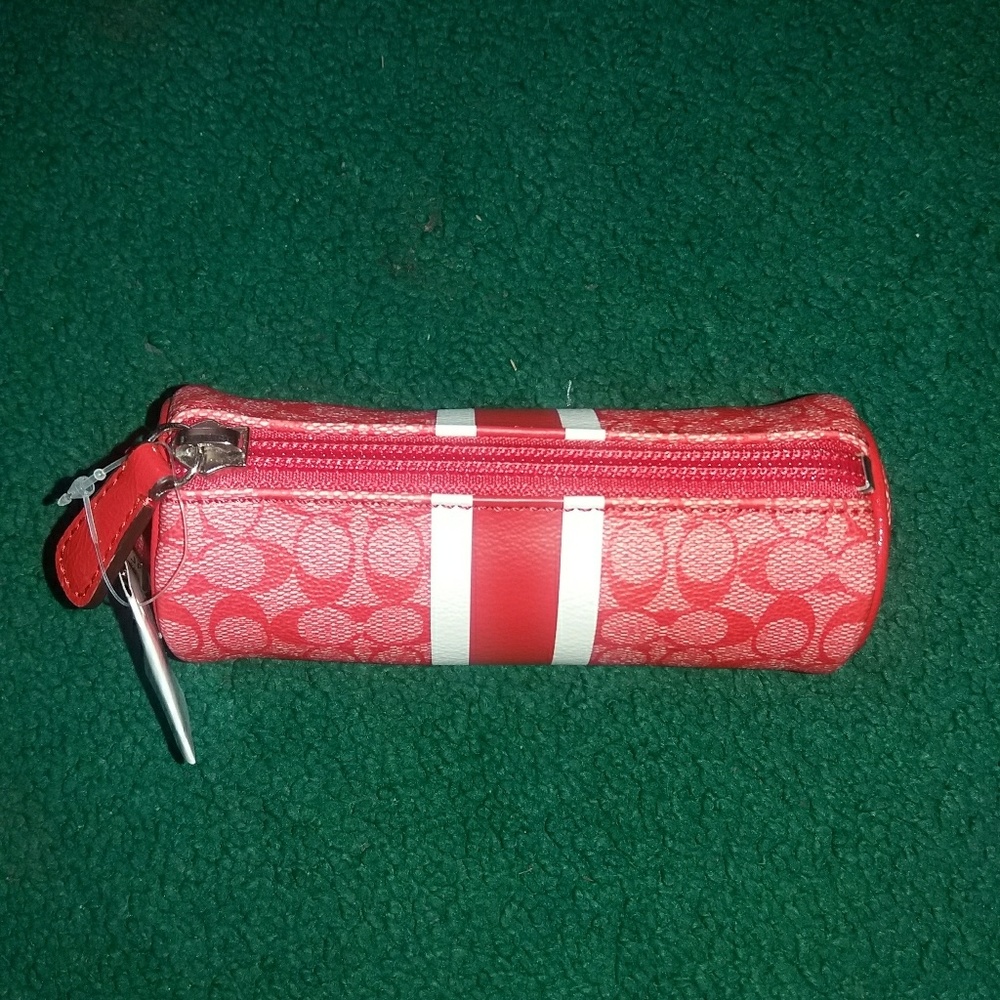 Coach golf balls and case